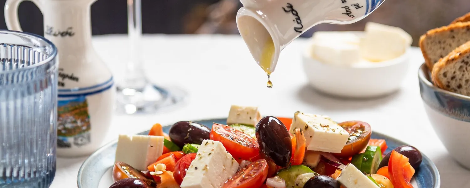 A colorful assortment of healthy dishes featuring fresh vegetables, whole grains and legumes, representing the world’s healthiest cuisines for preventing chronic illnesses.